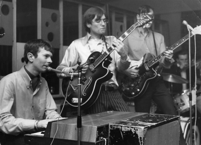 Left to right: Dave Field, Tom Winter, Barry Beaumont-Jones, John Redpath in back behind drums
