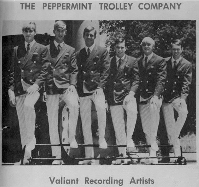 Peppermint Trolley Company "About a month into our new name on a big photo shoot at Knott's Berry Farm. These handsome lads are (l-r): Danny Faragher, Dave Kelliher (Roberts), Brad Madson, Dick Owens, Jimmy Faragher, Steve Hauser."