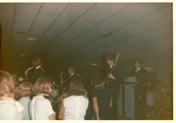 Five of a Kind on stage photo: Wayne Taylor lead guitar, Jay Vestal on sax and Phil Patterson on the bass guitar he wishes he still had, and Mike Magruder drums.