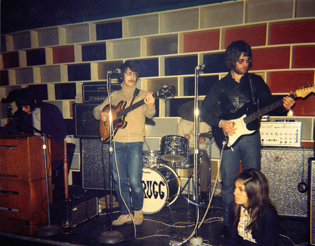 Scrugg live, left to right: Chris Demetriou, Jack Russell, Henry Spinetti (hidden) and John Kongos