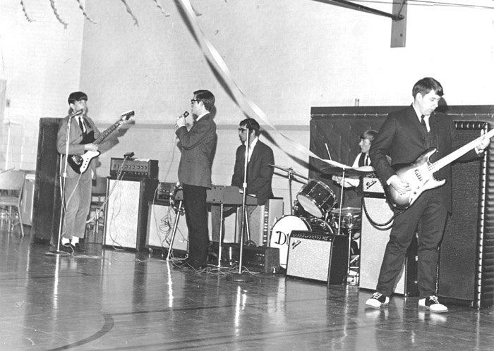 ROTC Ball at the South Oak Cliff HS gym, from left: Rollie, Jim, Rick Cramer, Gene, Glenn