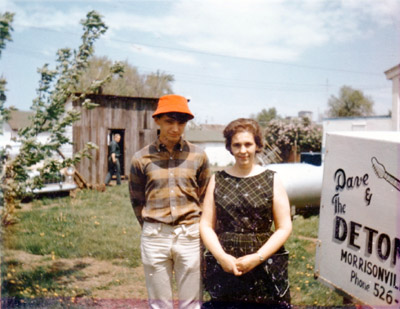 Richard Hall, a guitar student of Dave's, with Dave's mother Lillie and his father Clete in the back