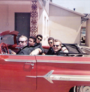 with keyboardist Toney Thompson’s 1959 Chevy at a motel in Bossier City, LA