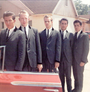 with keyboardist Toney Thompson’s 1959 Chevy at a motel in Bossier City, LA